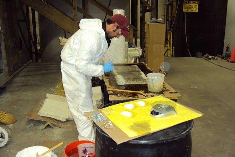 AmTech Crew Servicing a Fiberglass Tank Repair