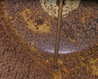 Corroded and Pitted Hot Water Storage Tank
